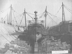 Bow view of USS Monadnock under construction in dry dock 1 at Mare Island Navy Yard in 1895.