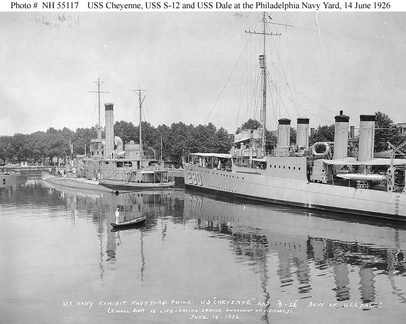 Cheyenne (IX-4), ex-Wyoming (BM-10) inboard at left; S-12 (SS-117), outboard at left; and Dale (DD-290) at the Philadelphia Navy Yard, 14 June 1926, during the National Sesquicentennial exhibit. The small boat and sailor, in the foreground, are on life-sa