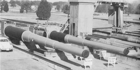 The 18.47 (45.7 cm) Mark A is the leftmost gun and a 16.50 (40.6 cm) Mark 7 gun as used on the Iowa's is just to its right.  Both of these weapons fired projectiles heavier than the Volkswagen on the left.